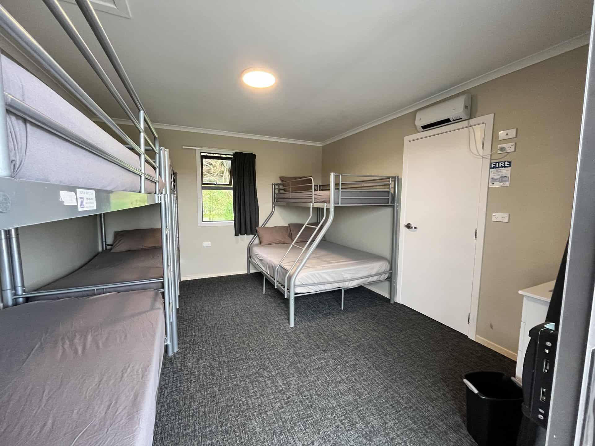 Standard Family Bunk room with queen bed and 5 bunks